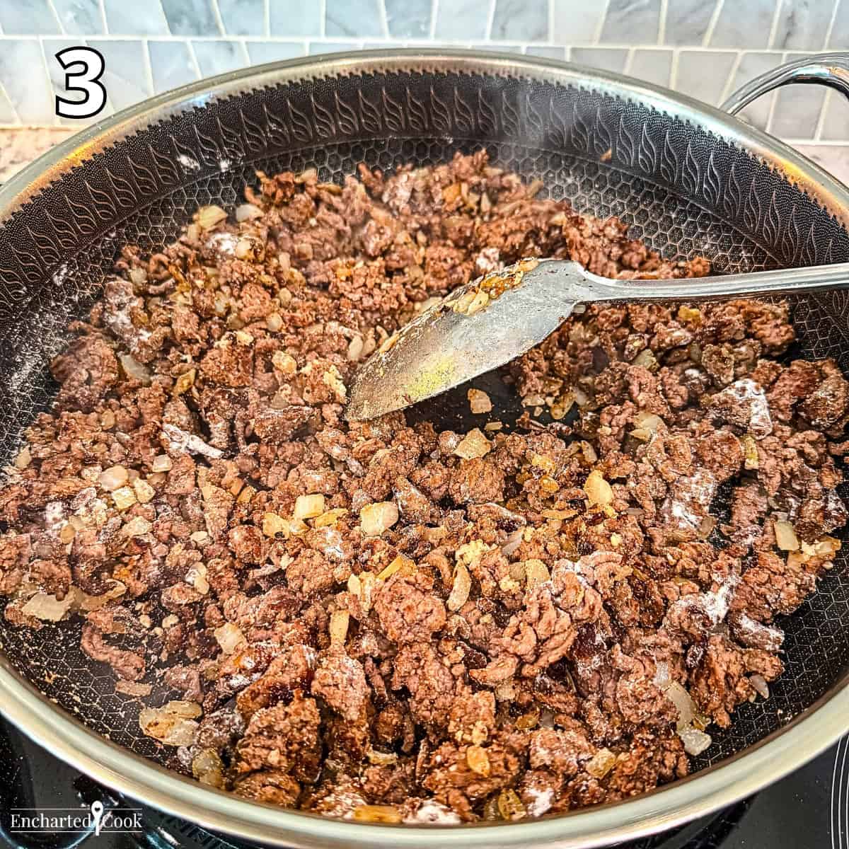 Process Photo 3 - Cooking onion, garlic, and flour with the browned ground beef.