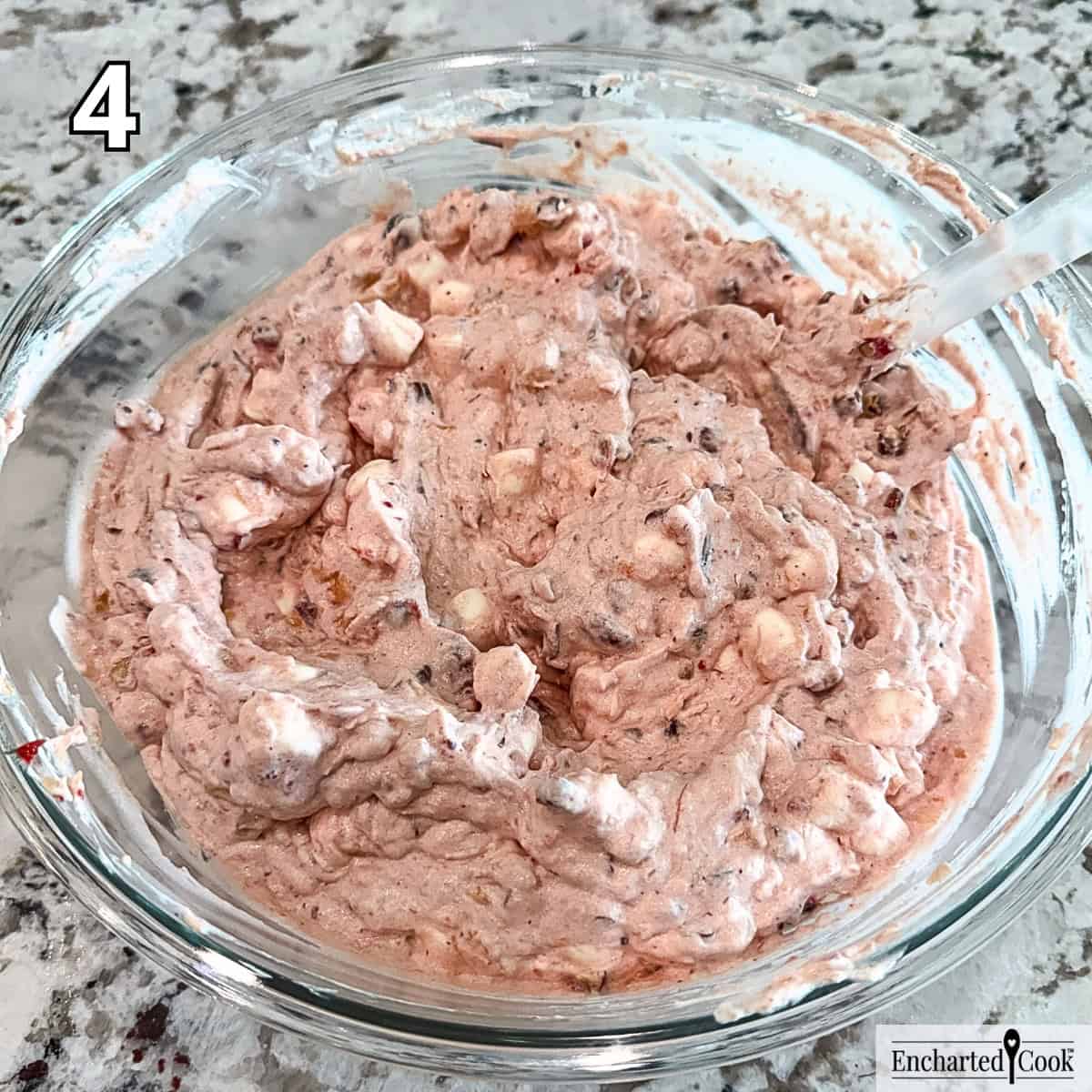 Process Photo 4 - Folding chopped pecans and mini marshmallows into the cranberry fluff.