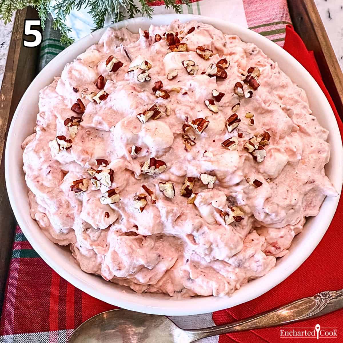 Process Photo 5 - The chilled cranberry fluff is ready to be served in a white bowl.