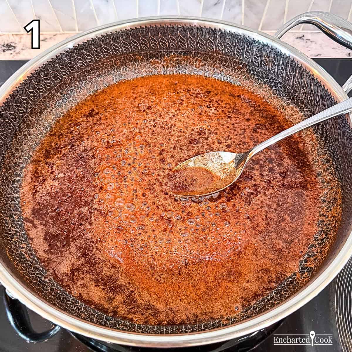 Process Photo 1 - Cooking butter, dark brown sugar, and cinnamon in a large pan.