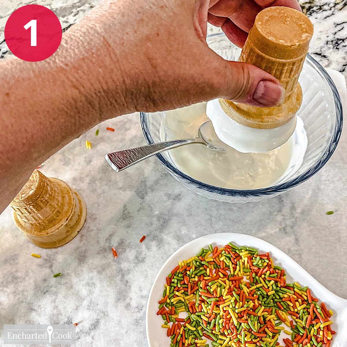 Process Photo 1 - Dip the top of each ice cream cone into melted white candy melts.