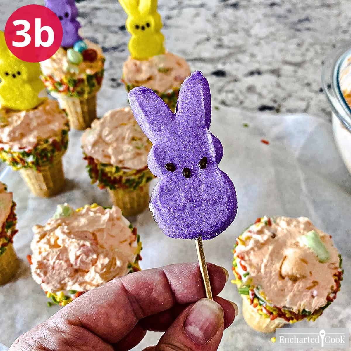 Process Photo 3b - While the cones dry, insert a toothpick in through the bottom of each marshmallow bunny.