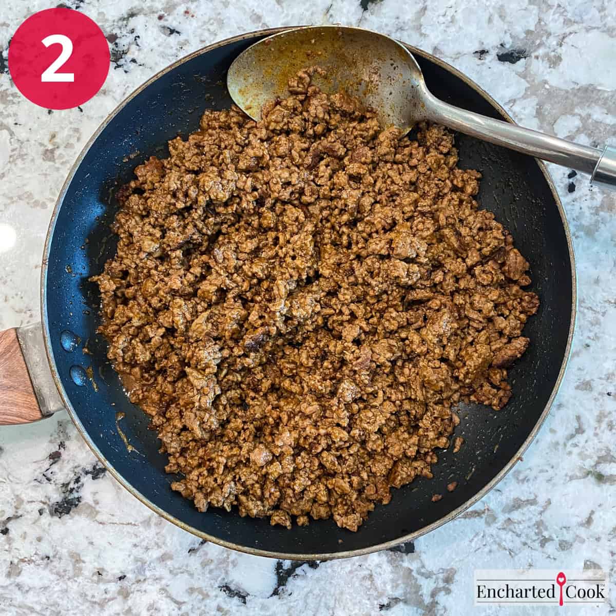 Process Photo 2 - Adding the taco seasoning to the browned ground beef.