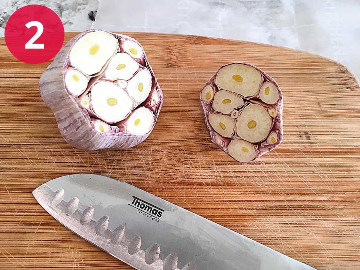 Process Photo 2 - Cutting the top off each bulb of garlic.