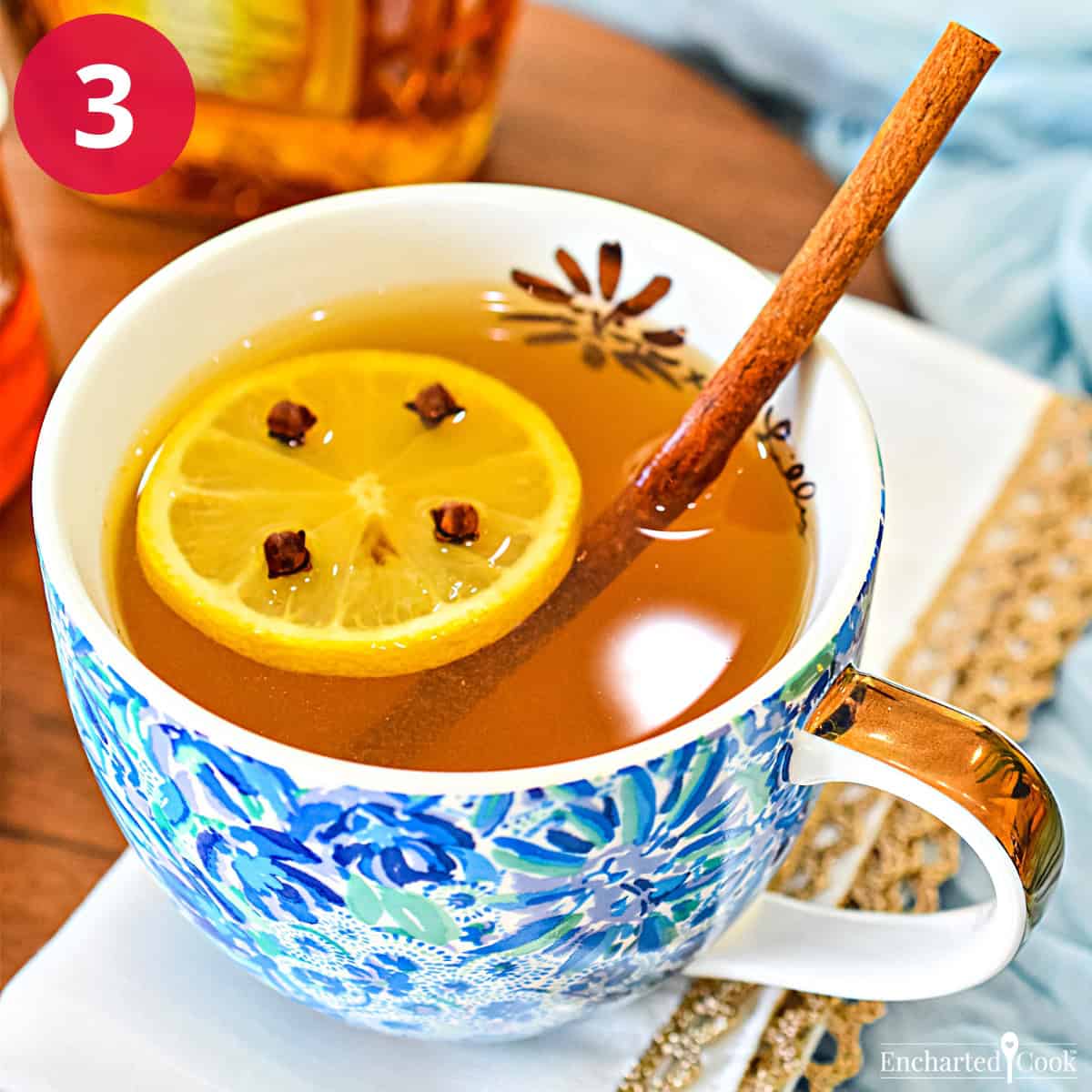 Process Photo 3 - Complete the toddy with more boiling water and garnish with lemon, cloves, and or a cinnamon stick.