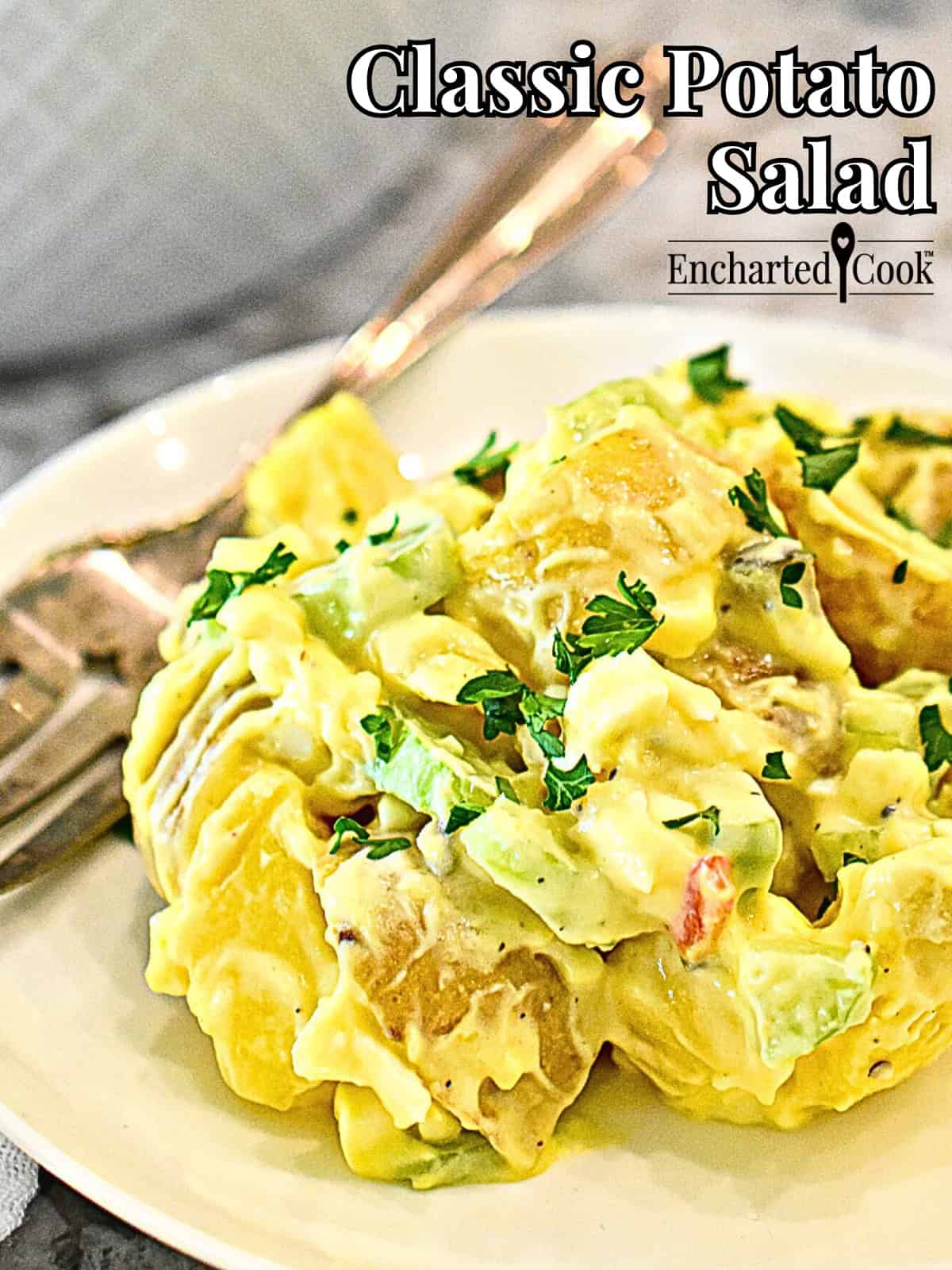 Classic Potato Salad on a white plate with a fork and text overlays.