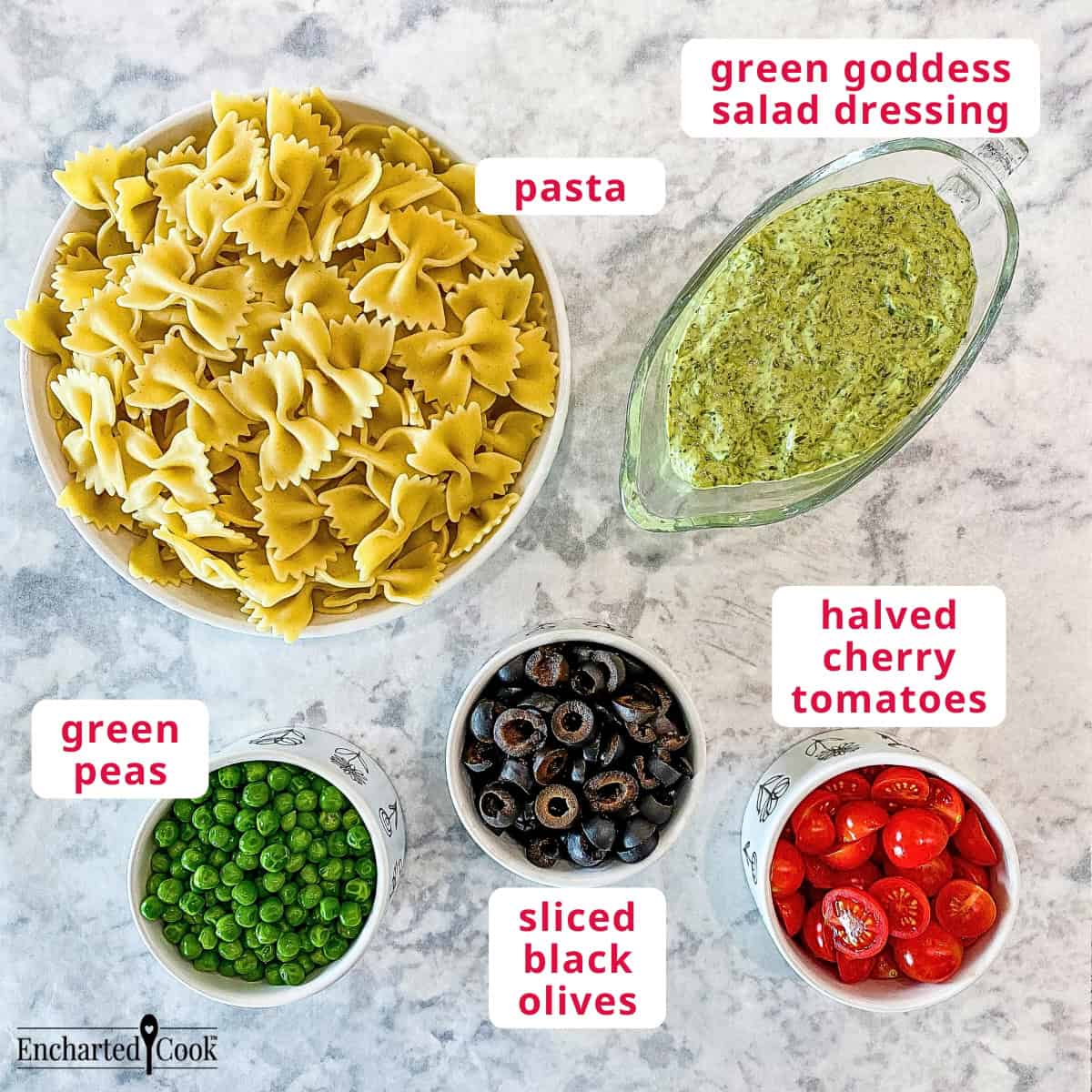 The ingredients, clockwise from top right: green goddess salad dressing, halved cherry tomatoes, sliced black olives, green peas, and pasta.