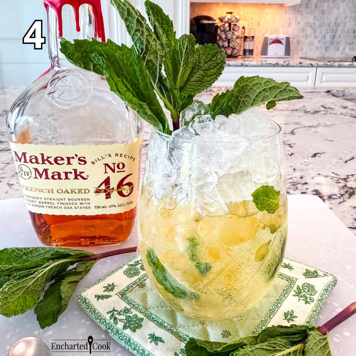 Process Photo 4 - The finished Mint Julep in a clear glass and garnished with a large sprig of mint.