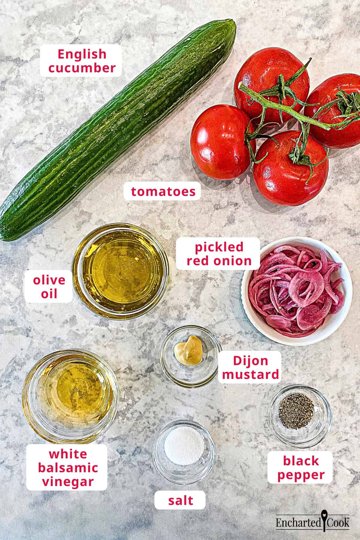 Tomato Cucumber Salad ingredients, clockwise from top left: English cucumber, tomatoes, pickled red onion, Dijon mustard, black pepper, salt, white balsamic vinegar, and olive oil.