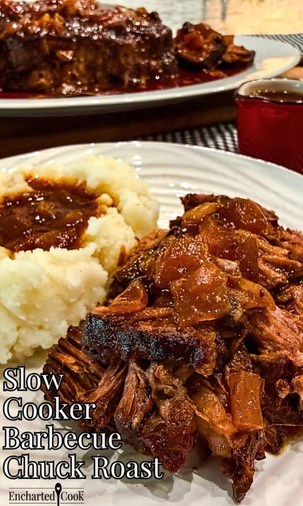 Slow cooker barbecued chuck roast is shredded and served with mashed potatoes and jus poured over the meat and the potatoes with text overlays.