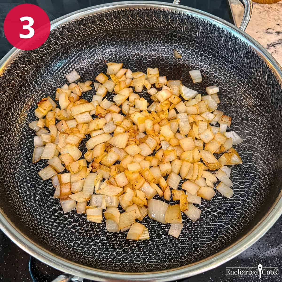 Process Photo 3 - Cooking the chopped onion in a skillet until it is translucent and golden brown.