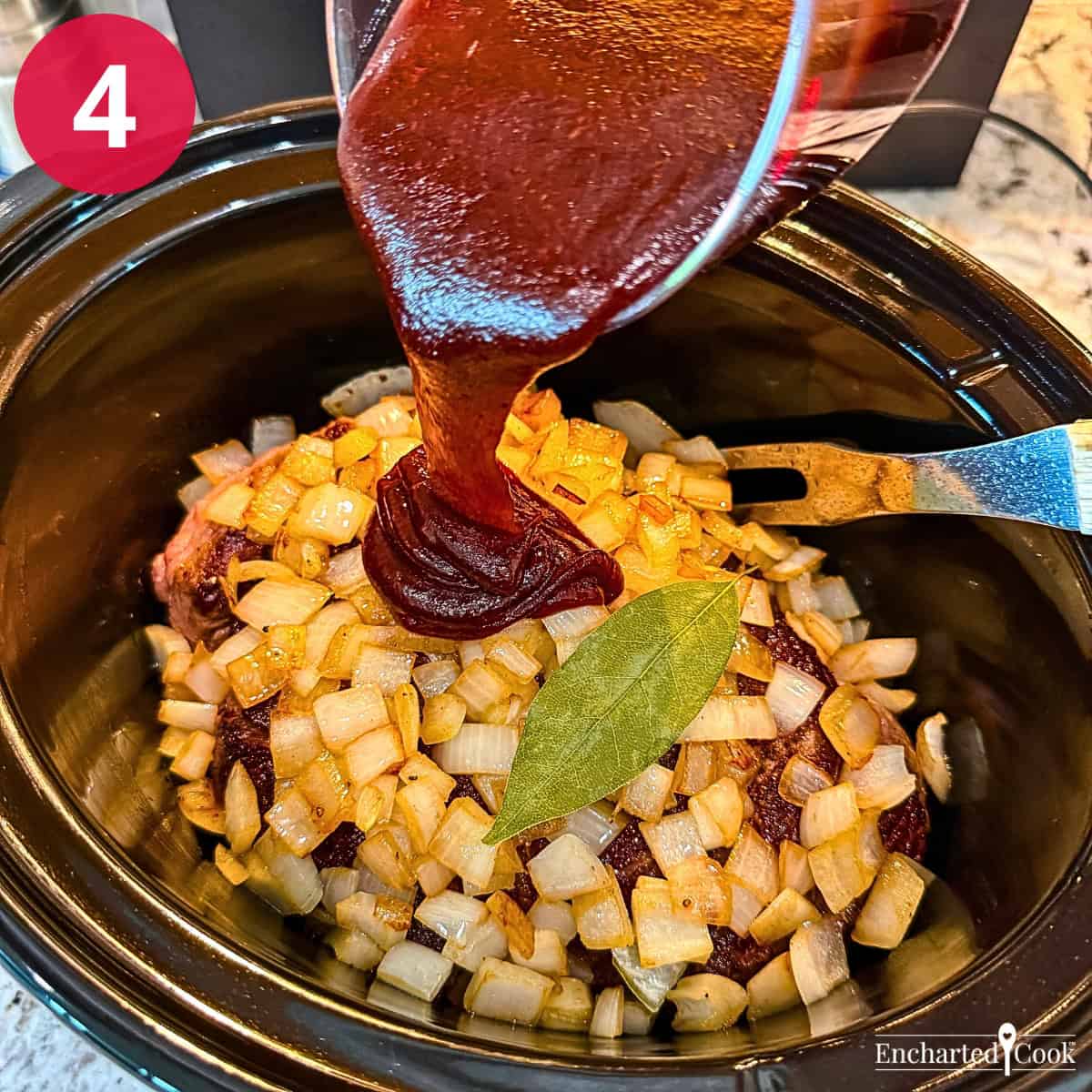 Process Photo 4: Pouring barbecue sauce over the seasoned and browned meat, onions, and bay leaf.