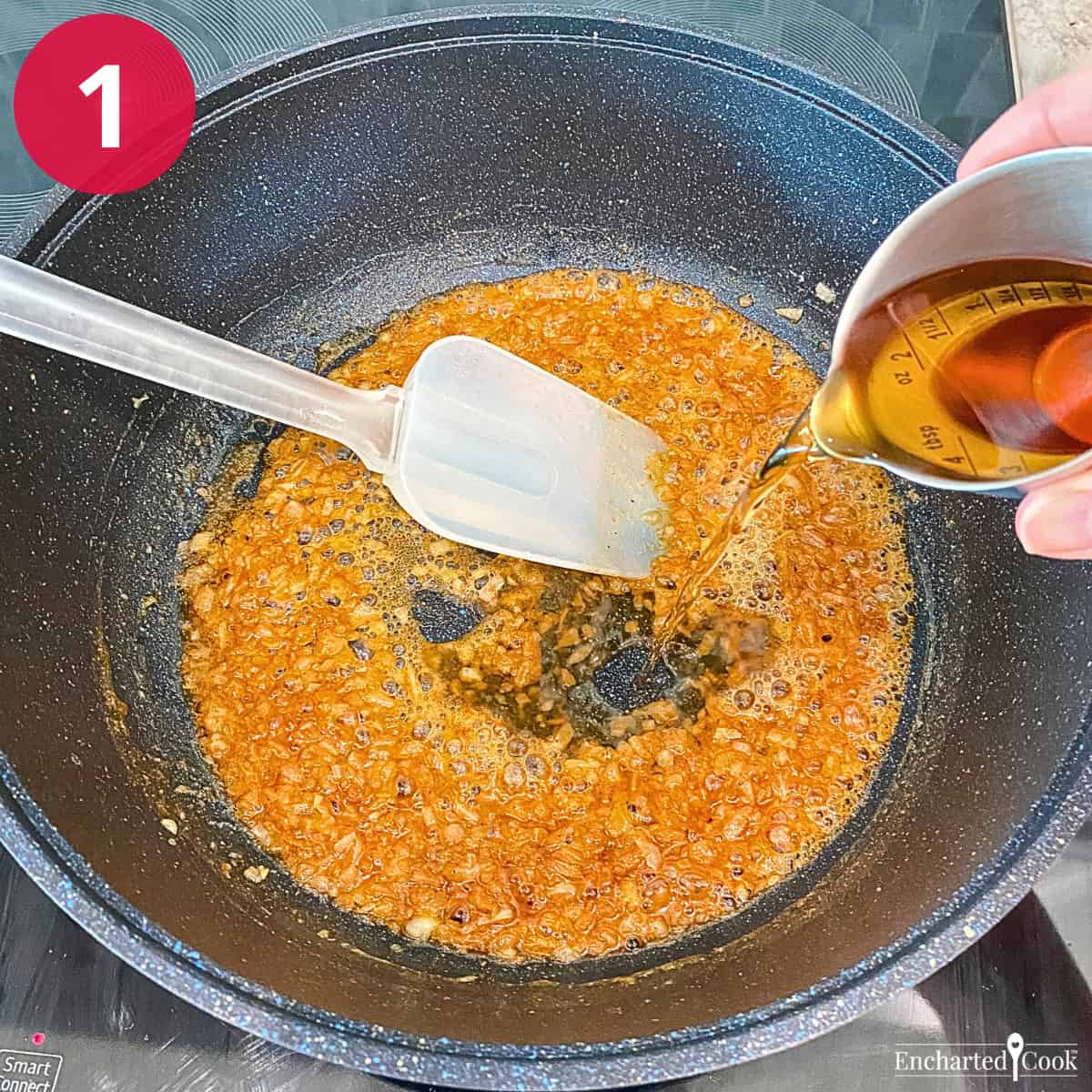 Process Photo 1 - Brandy is added to the sautéed onion and spices.