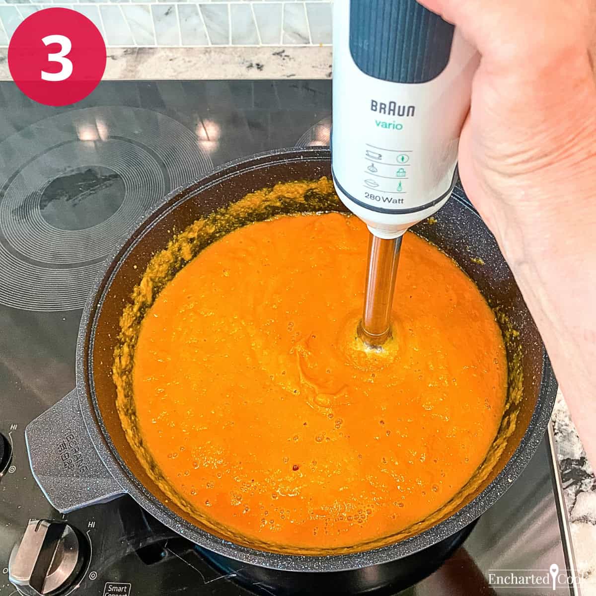 Process Photo 3 - A stick blender is used to puree the soup to blend all of the ingredients and make it smooth.