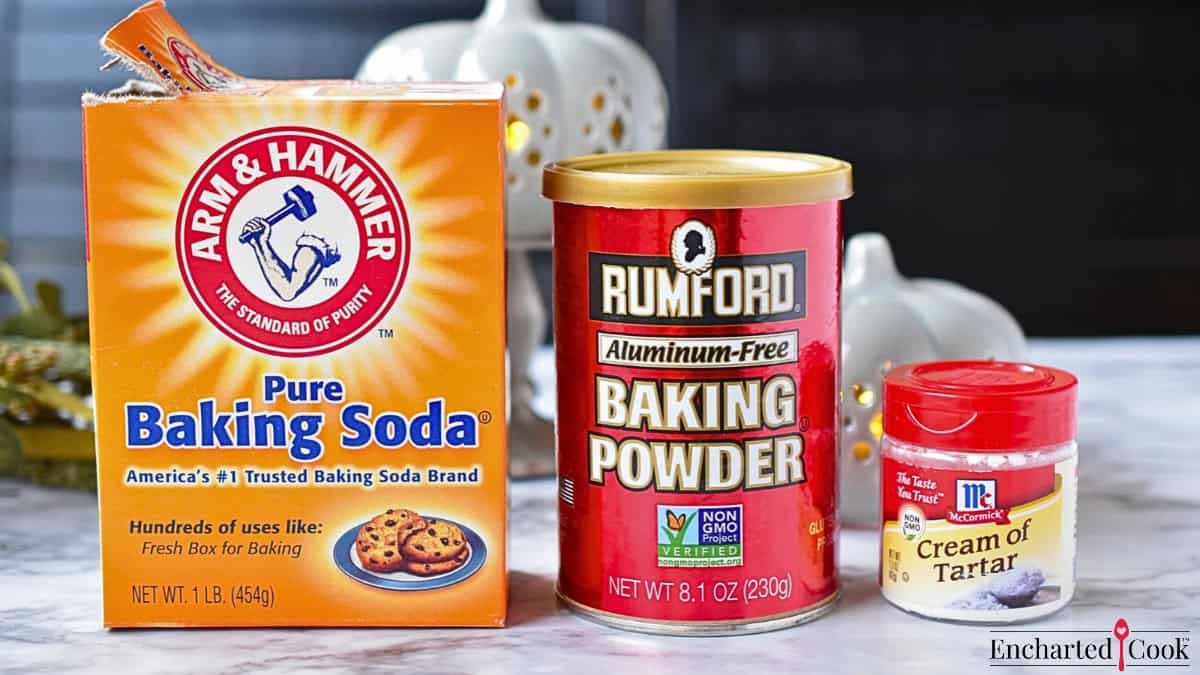 Name brand containers of baking soda, baking powder, and cream of tartar.